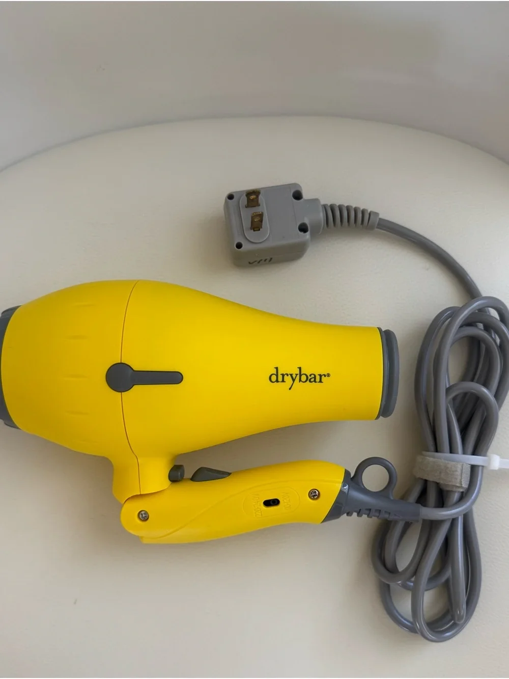 Drybar Yellow Foldable Travel Hair Dryer